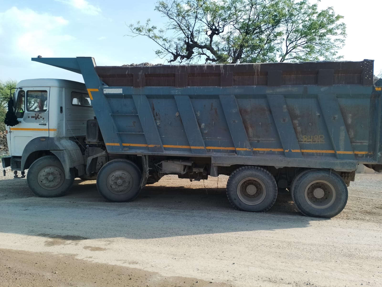 High-capacity dumper trucks hauling aggregates